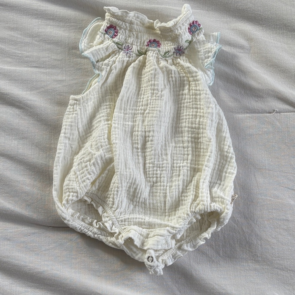 Charming Cream Baby Romper with Floral Accents